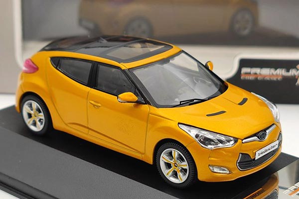 1/43 scale Hyundai Veloster diecast model in Orange